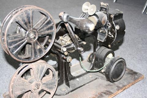 A vintage 35mm film projector.