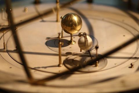 An orrery — a mechanical model of the solar system.