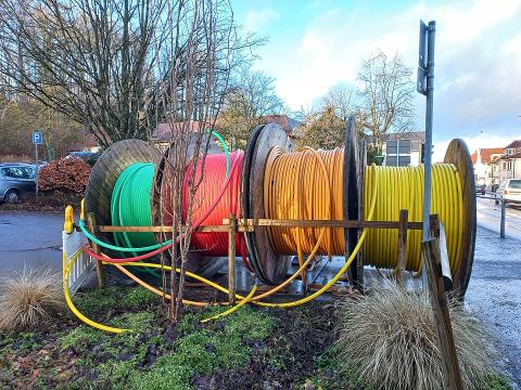 Reels of optical-fibre telecommunications cable.