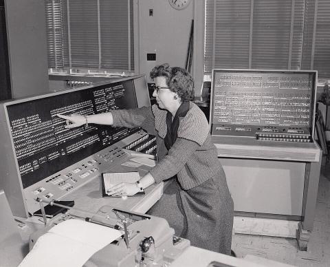 Women operating computing equipment in the 1950s.