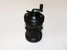 A Curta mechanical calculator.