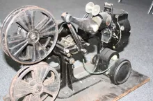 A vintage 35mm film projector.