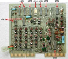 An Intel 4004 microprocessor (1971) mounted on a Busicom calculator circuit board.