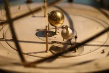 An orrery — a mechanical model of the solar system.