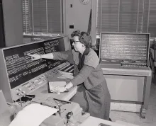 Women operating computing equipment in the 1950s.